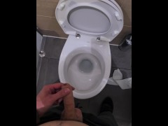 Male peeing in the public toilets during work time | 4K