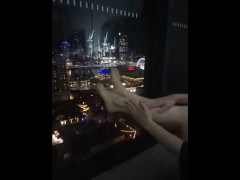 Foot stroking in the night city
