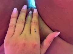 Playing with wet pussy while tanning