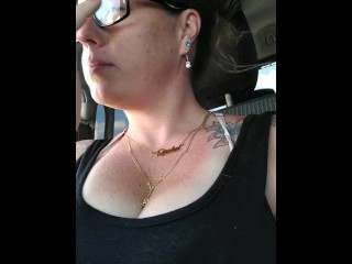 Nerdy Milf Smoking Cigarettes Showing Cleavage In Truck