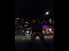 Milf masturbates and cums busy downtown city corner after pissing