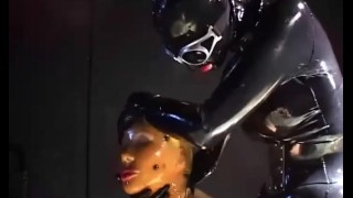 High Heels Part 2 Features Two Sexy Lesbians Fully Encased In Latex Suits Having Fun In Her Rubber Skins