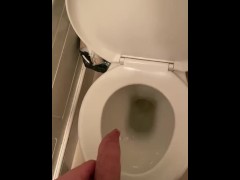 Peeing with a hard cock