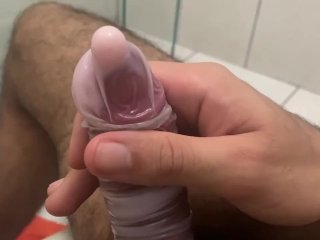 Jerking Off Playing Inside The Condom Full Of Cream Conditioner
