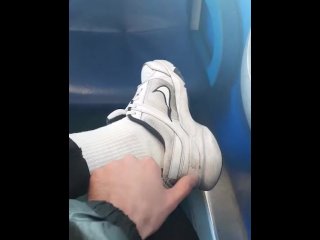 White Socks And Sneakers. A Guy Jerks Off A Dick Through Jeans In An Empty Train