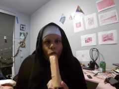 Naughty Nun Sucks Dildo