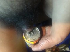 Pissing on a Thai tea soda can