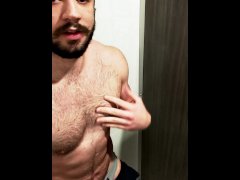 Horny jock plays with his thick cut cock in the gym showers
