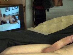 Horny big dick guy unleashes a load of cum watching sensual love making porn