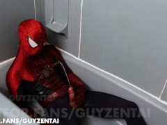 spiderman pisses all over his suit with hard cock