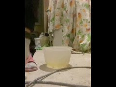 Girl pee into food bowl during the repair