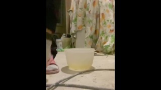 Girl pee into food bowl during the repair