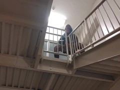 MILF rubs pussy and squirts off parade stairs