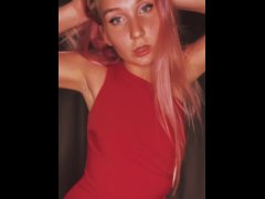 Girl in a sexy red dresss moking a cigarette and dancing
