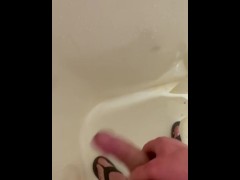 Tease playing with my chub in a public shower