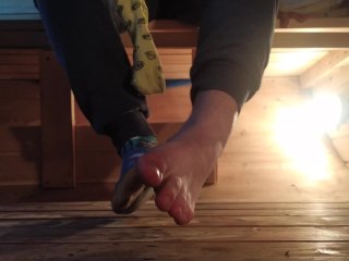 Teen Boy In Dirty Colorfull Socks After A Day In The Sauna And Taking Off His Socks To Bare Foot