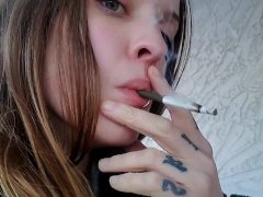 Beth Smokes a Marijuana Cigarette