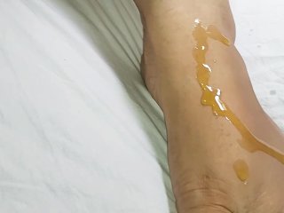 Massaging The Feet With Oil