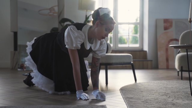 Mistress spanks maid