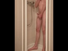 teen masturbates in the shower until he squirts