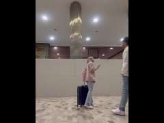 beautiful petite girl is approached by a stranger at the airport