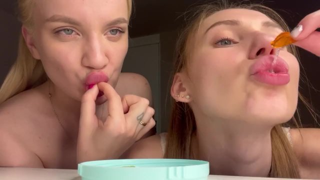 Two lesbian giantesess dine tiny men