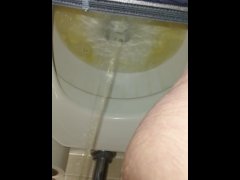 Good morning close up piss and toilet water view