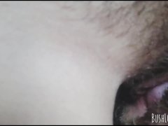 Up close eating big hairy pussy and sucking on her juicy pussy lips.