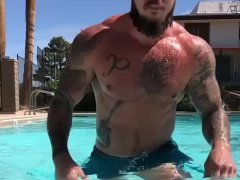 Inked daddy hunk shows off dickprint & muscles at the pool