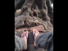 Flip flops dude on the streets wiggling his foot
