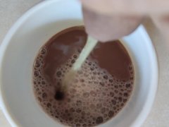 Piss into a cup of chocolate milk