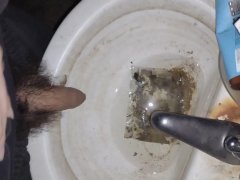 Hairy cock man pissing in old dirty sink