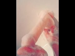 Soapyfootjob with toy in shower
