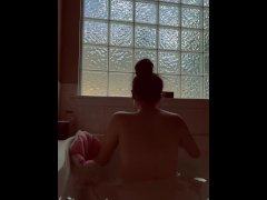Young petite Milf takes massive toy while in the bath