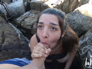 HotBrunette Gives Risky Blowjob at theBeach