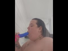 Sucking dildo in shower