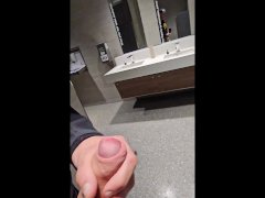 johnholmesjunior does risky solo show and shoots massive cum load in busy canadian airport bathroom